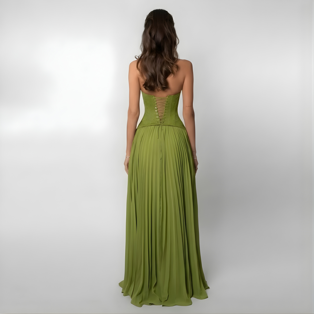 Flowing women's pleated halter maxi dress with a flattering open back, an elegant choice for evening wear or guests.