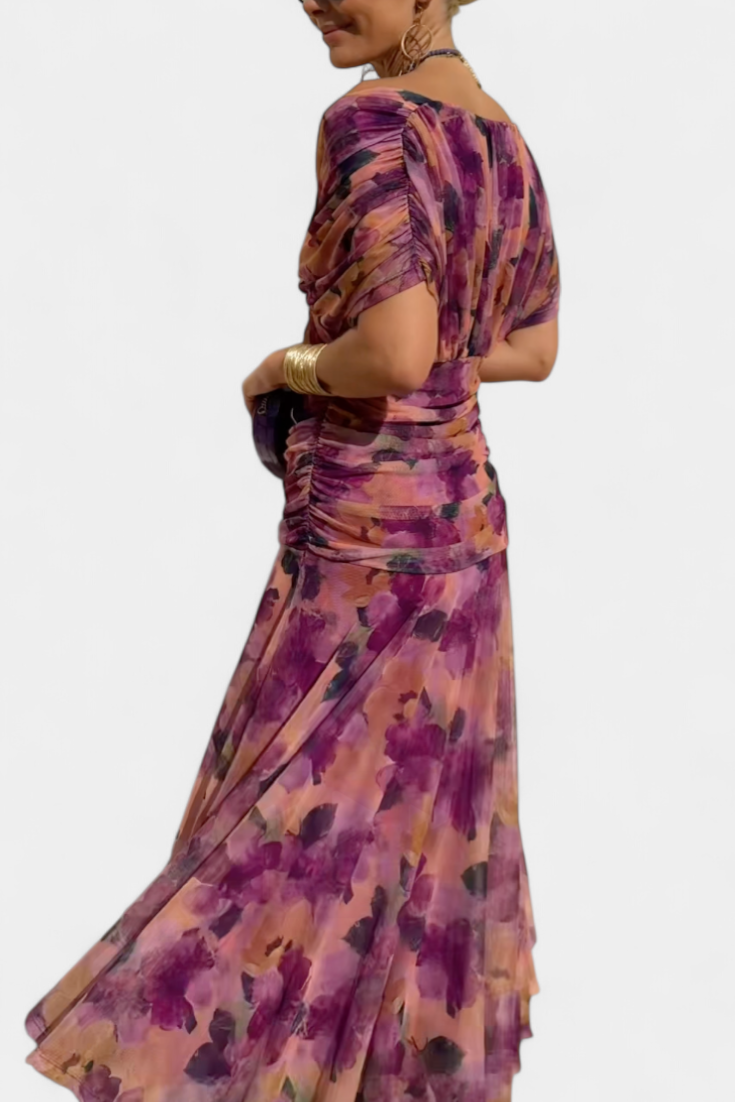 Formal women's maxi dress featuring a pleated waist and V-neck, ideal for wedding guests.