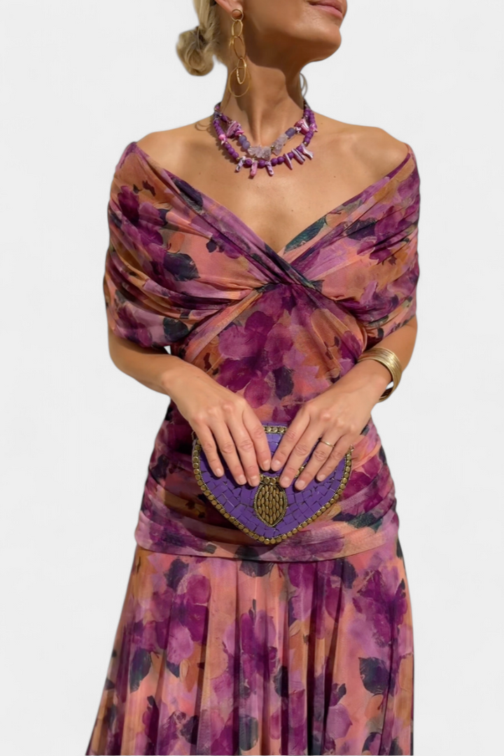 Beautiful women's formal gown, a pleated maxi dress with an elegant V-neck and sleeveless cut.