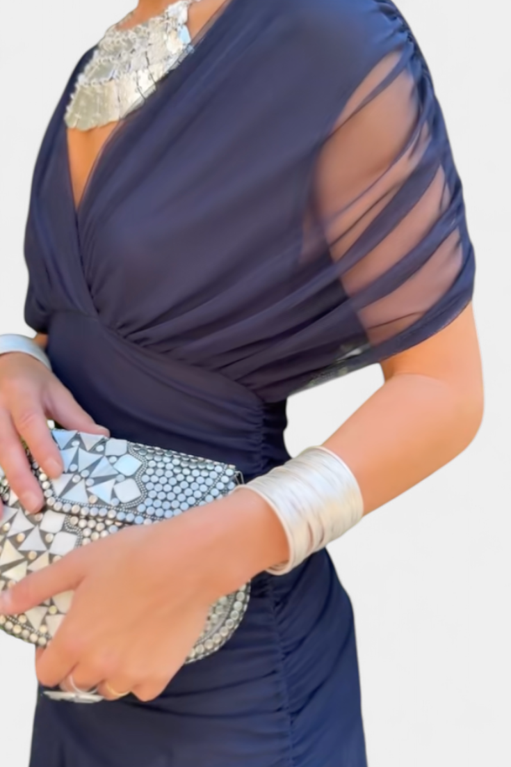 Stylish sleeveless pleated maxi dress, an elegant formal gown for women, ideal for evening events.