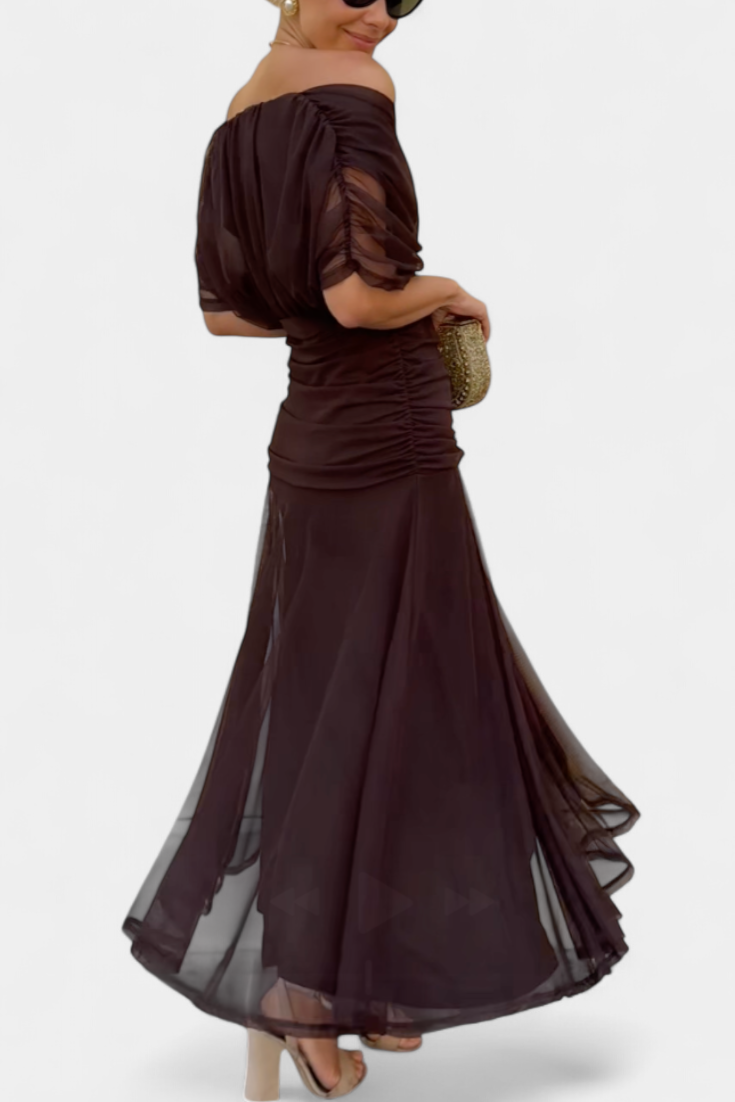 Beautiful formal evening gown for women, a pleated maxi dress ideal for wedding guests.