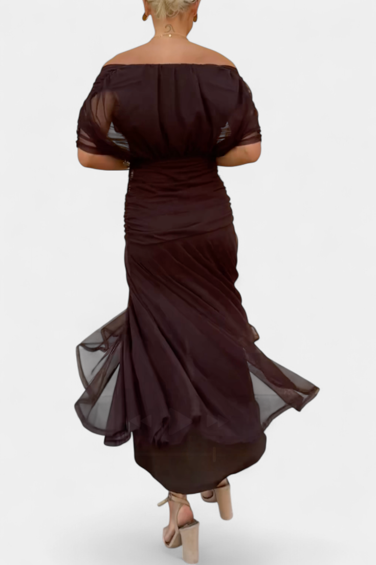 Women's elegant maxi dress featuring a V-neck and pleated waist, great for formal occasions.
