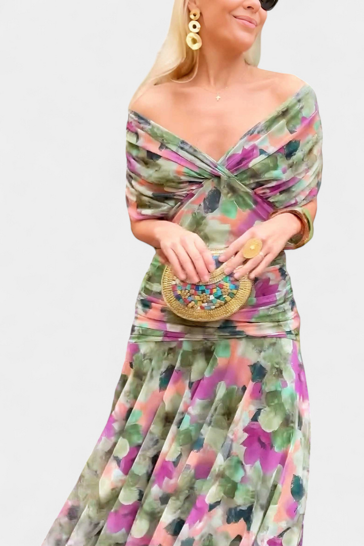 Chic women's wedding guest dress, a pleated maxi gown with an elegant V-neck design.