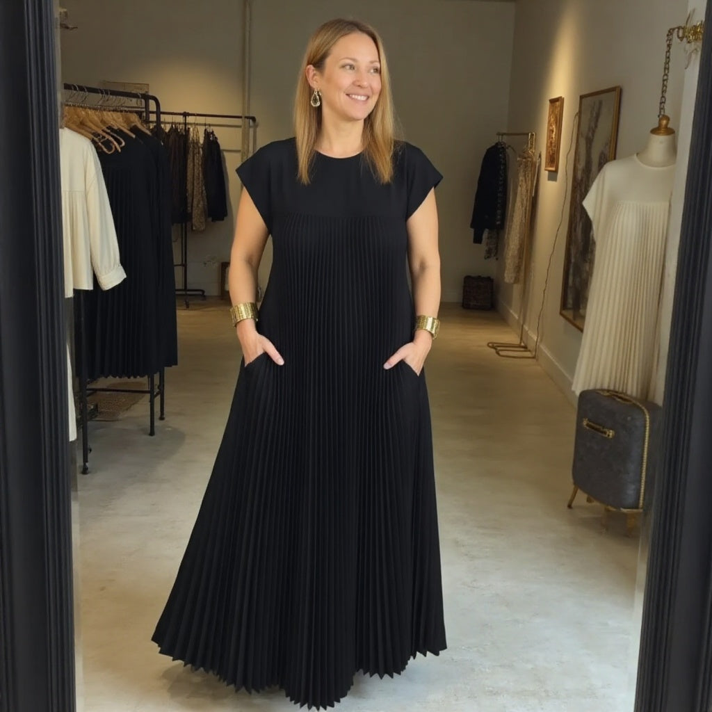 Women's elegant pleated maxi dress, with a flowing design for ultimate comfort & style.