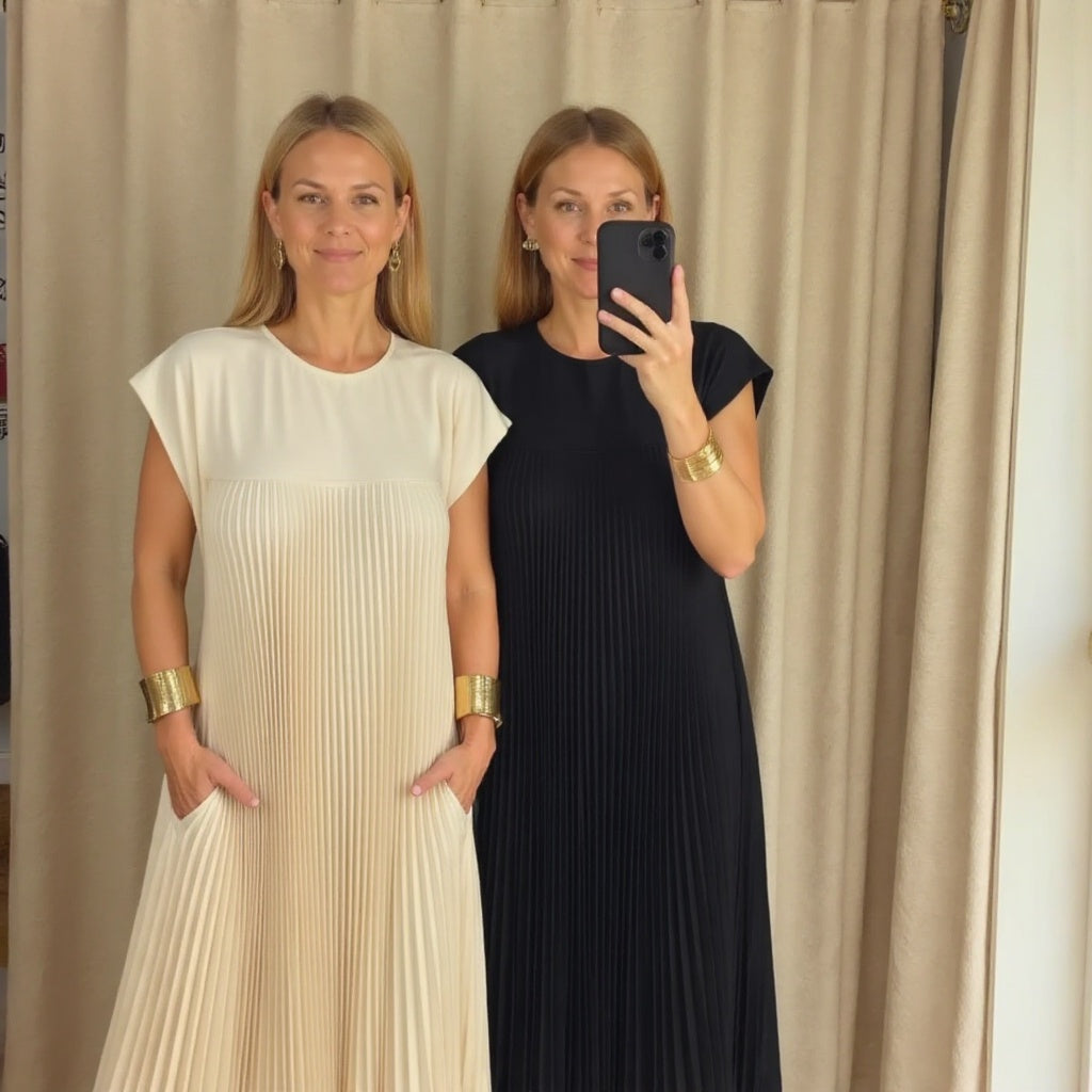 Versatile women's pleated maxi dress, offering an elegant, flowing silhouette for various occasions.