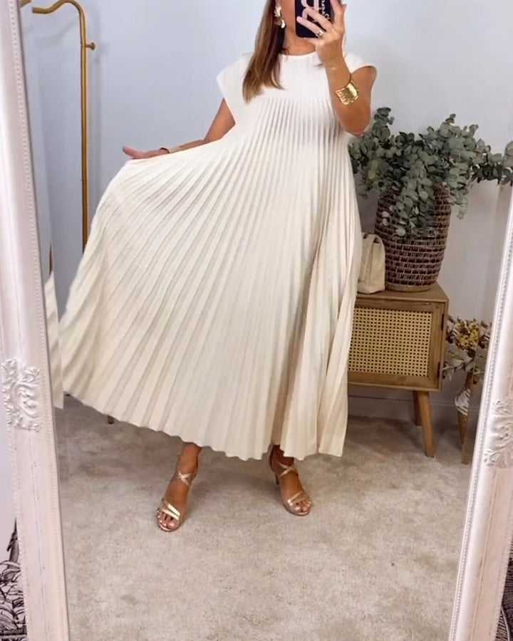 Stylish women's pleated maxi dress, perfect for a comfortable, versatile & elegant summer wardrobe.