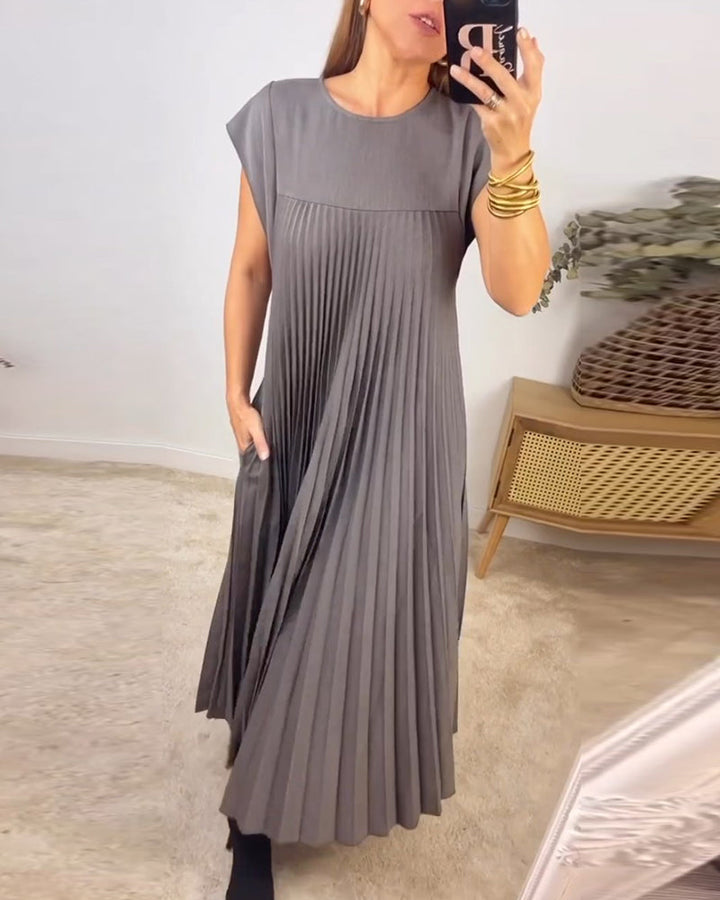 Sophisticated women's elegant maxi dress with beautiful pleats, perfect for any occasion.