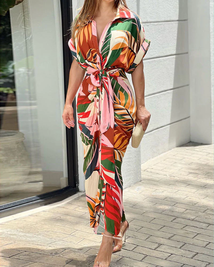 Elegant women's pleated maxi dress with collar, perfect for sophisticated summer style or spring fashion.