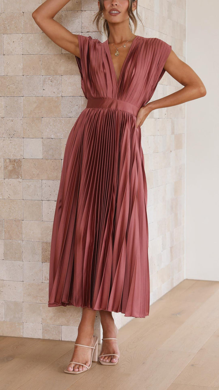 Sophisticated ladies' sleeveless maxi dress, pleated design, ideal for wedding guests.