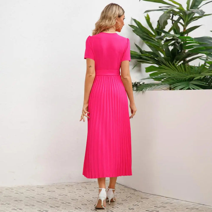 Graceful women's pleated midi wrap dress, elegant and versatile for formal events and evening wear.