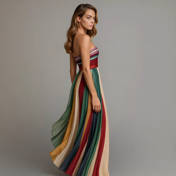 Stylish women's pleated strapless long dress for parties. Elegant maxi gown with a flattering, sleeveless design.