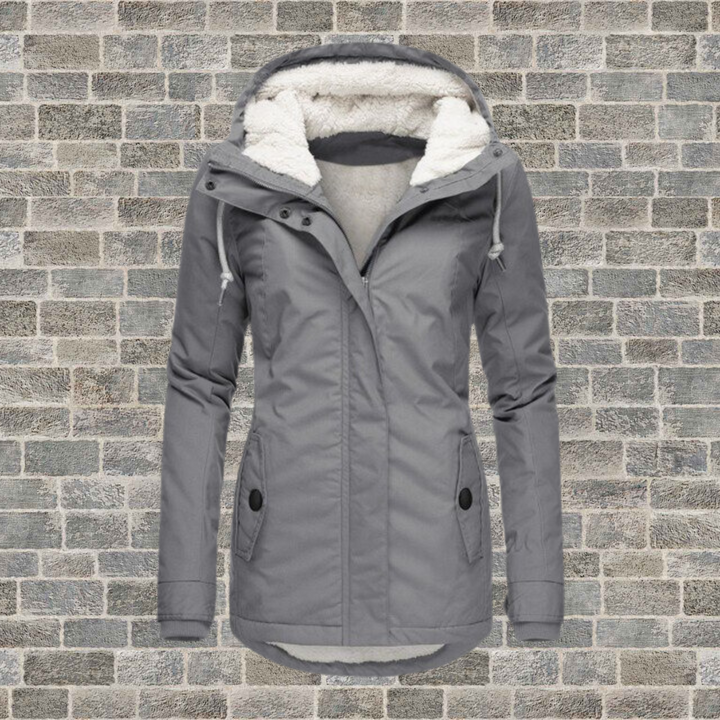 Fashionable women's long pleated winter jacket, offering elegance and warmth for the winter season.
