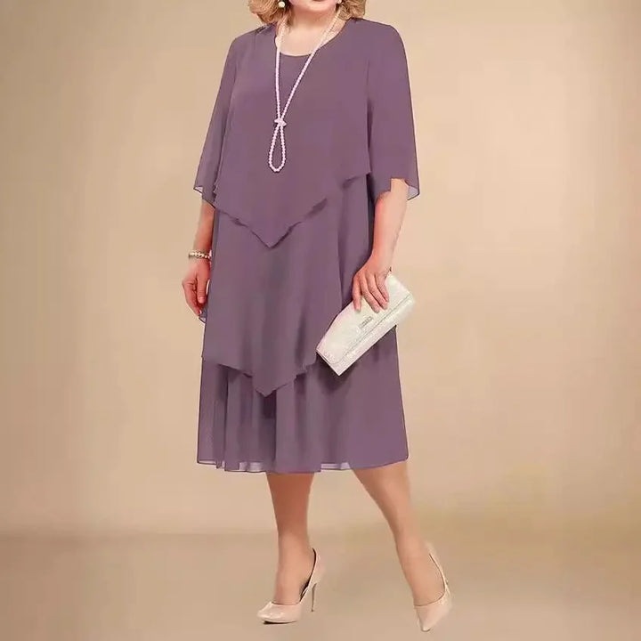 Flattering plus size asymmetrical midi dress for women, designed for comfort and chic formal event wear.