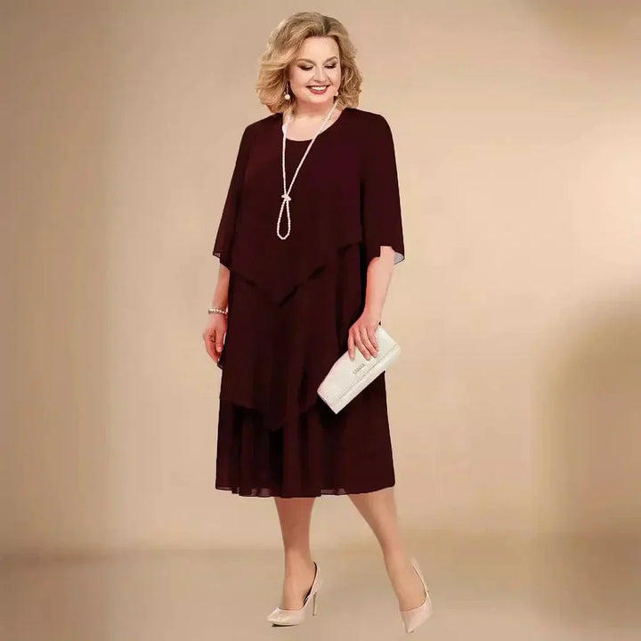 Flowy elegant plus size asymmetrical midi dress for women, a sophisticated choice for any formal event or celebration.