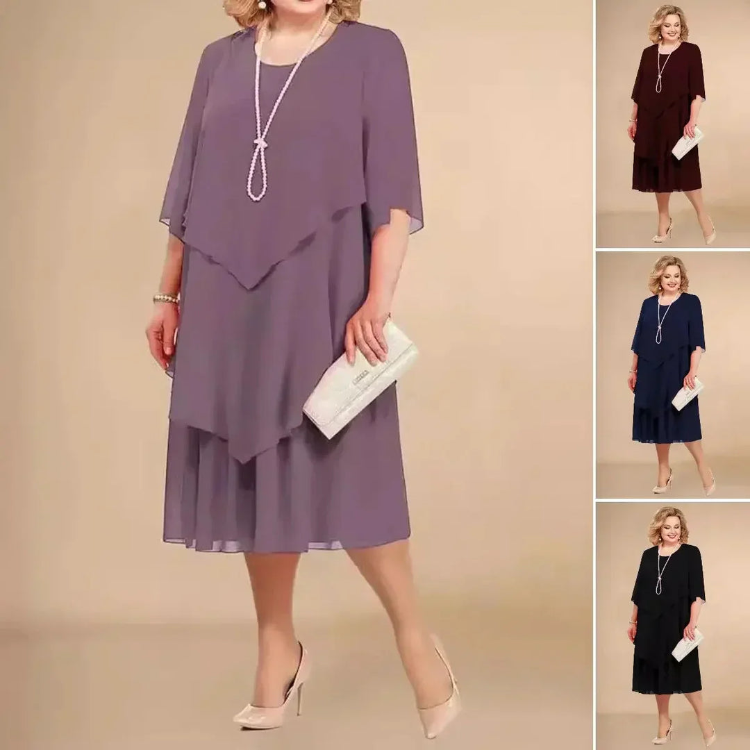 Comfortable and elegant women's plus size asymmetrical midi dress, perfect for formal events and celebrations.