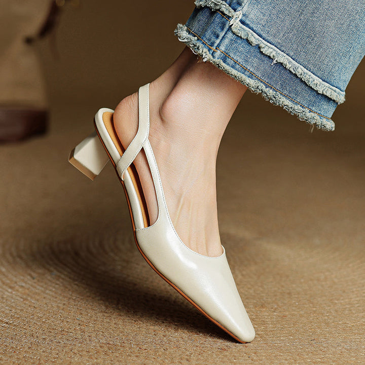 Back view of women's classic pointed toe heels. Elegant low heel design for stability and style.