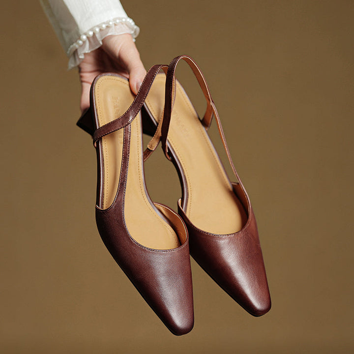 Cream elegant women's pointed toe heels. Low heel comfort for daily wear or special occasions.