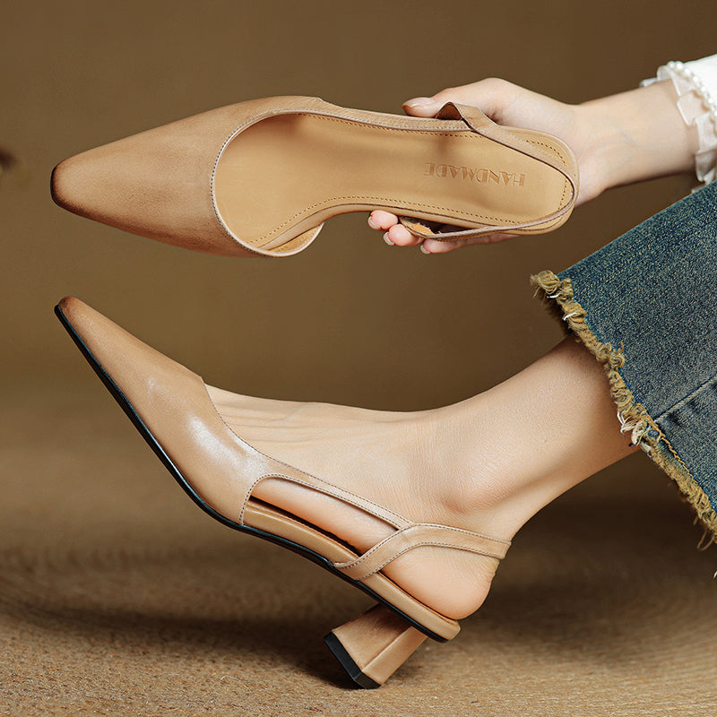Low heel detail on comfortable women's pointed toe dress shoes. Elegant and stable footwear.