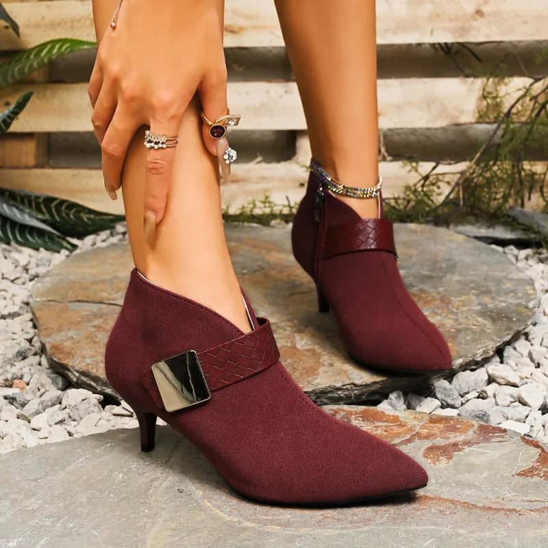 Front view of women's elegant pointed toe heels, perfect for dressy occasions.