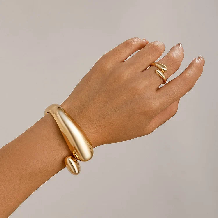 Celina women's elegant alloy cross bracelet, polished with unique irregular design. A stylish and versatile accessory.