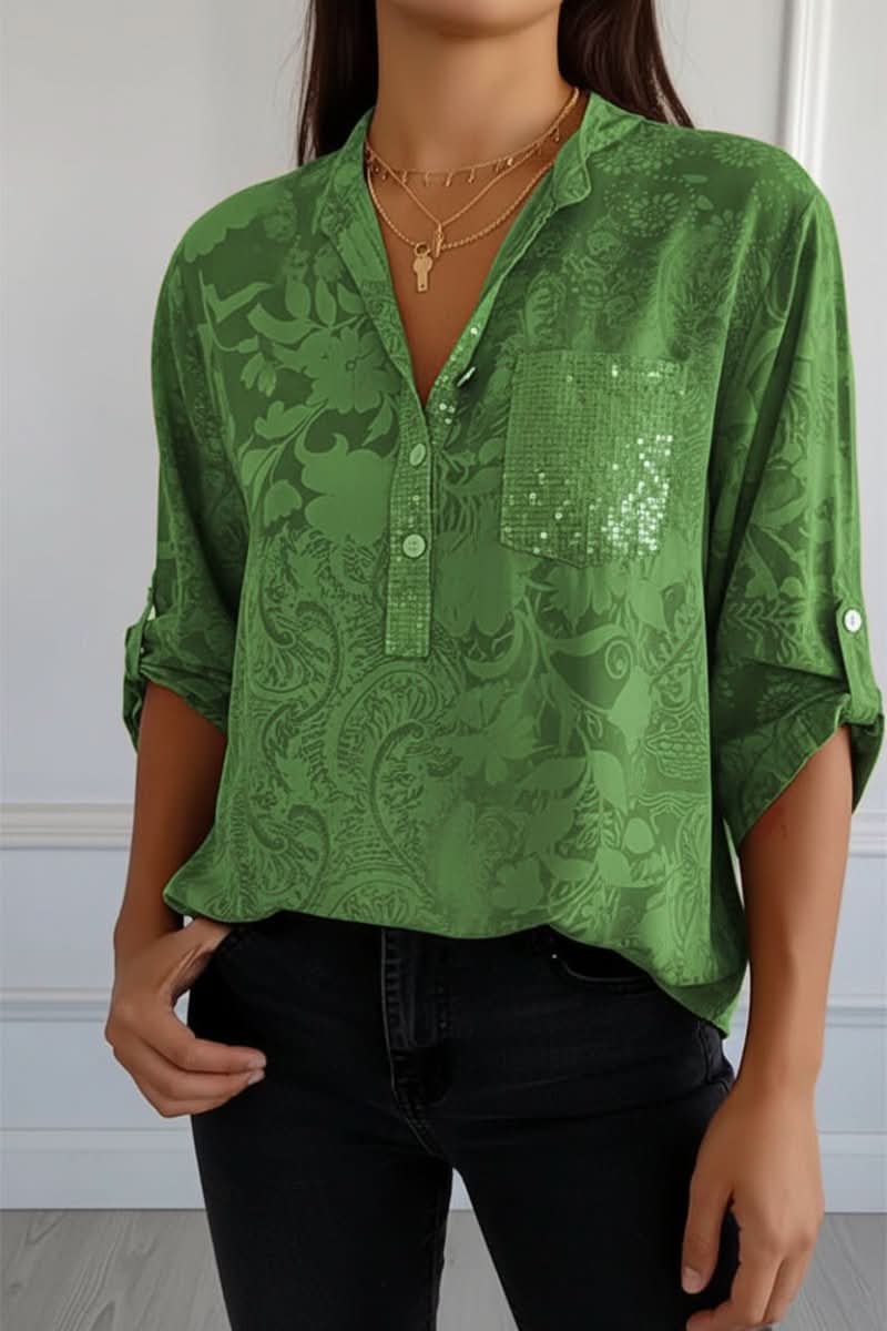Chic women's printed long sleeve blouse featuring a stylish front pocket, perfect for elegant casual wear.