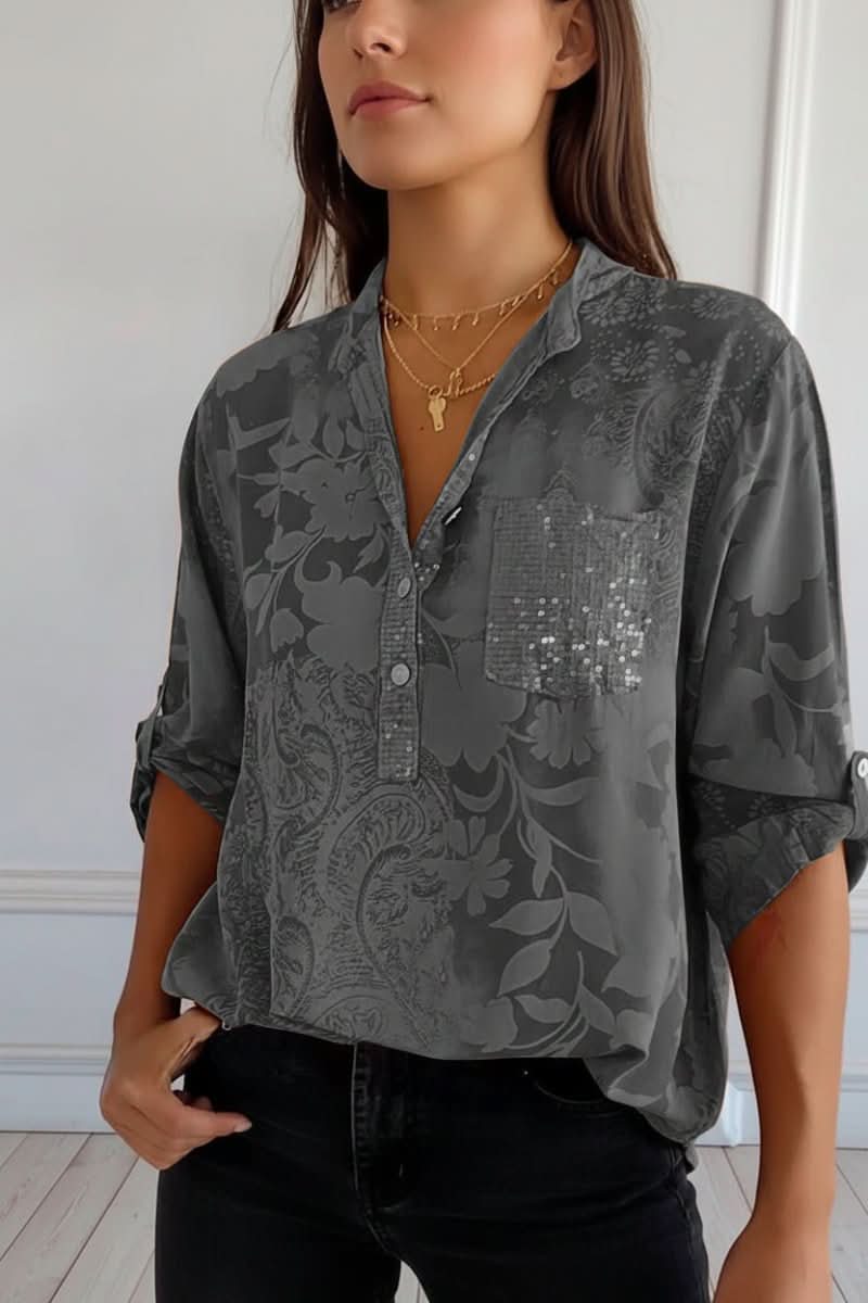 Comfortable & elegant women's long sleeve printed blouse with a front pocket, perfect for work or style.