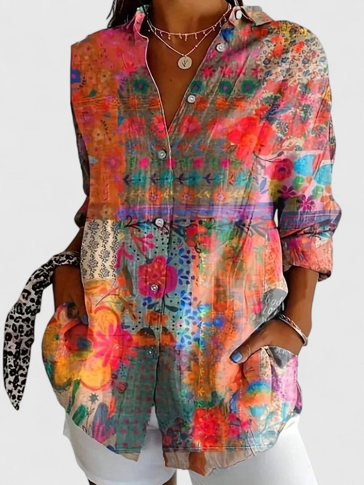 Comfortable & versatile women's printed blouse, perfect for casual or sophisticated wear. Colorful ladies' top.