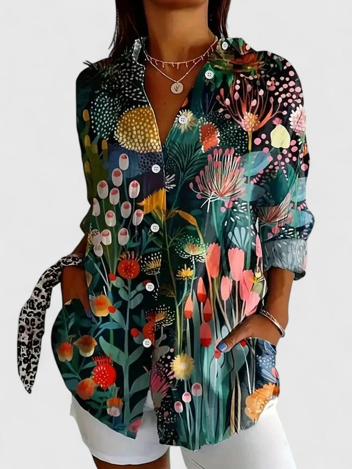 Stylish women's printed blouse offering comfortable, chic, and versatile wear. Elegant ladies' fashion apparel.