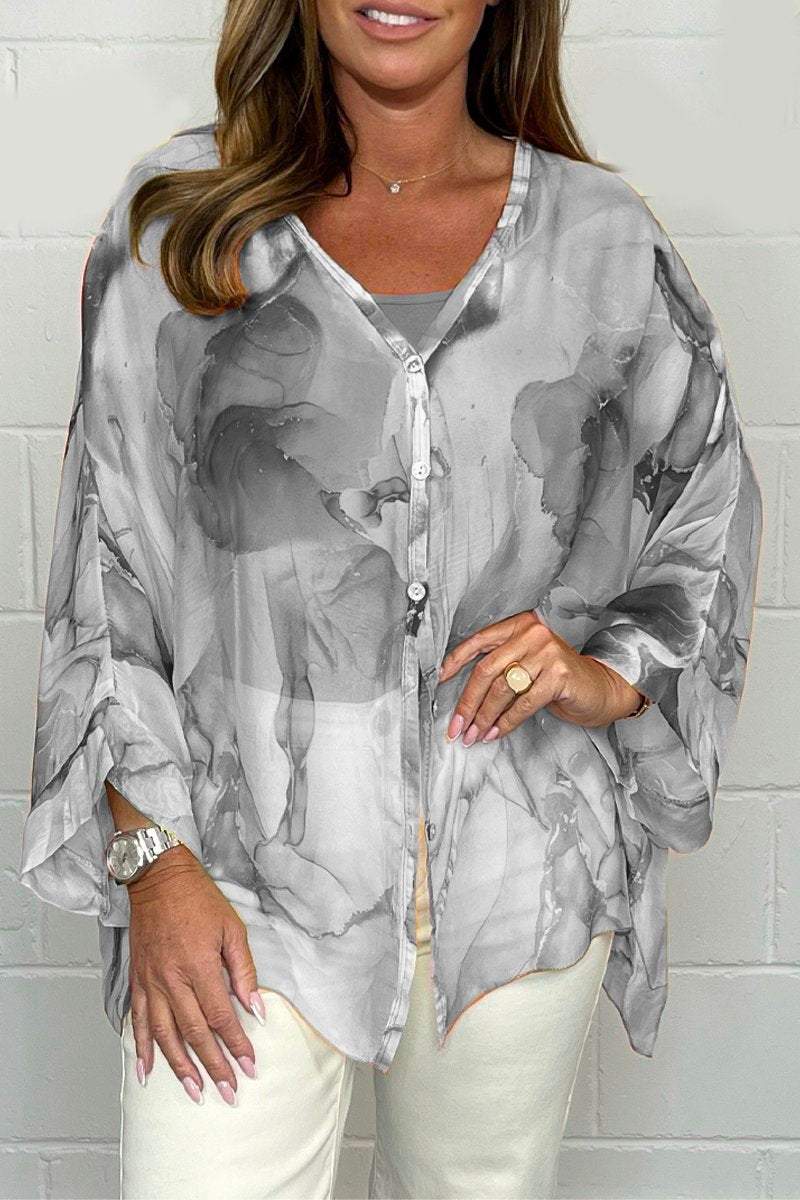 Elegant women's printed long sleeve blouse with a relaxed fit, perfect for casual spring & summer fashion.
