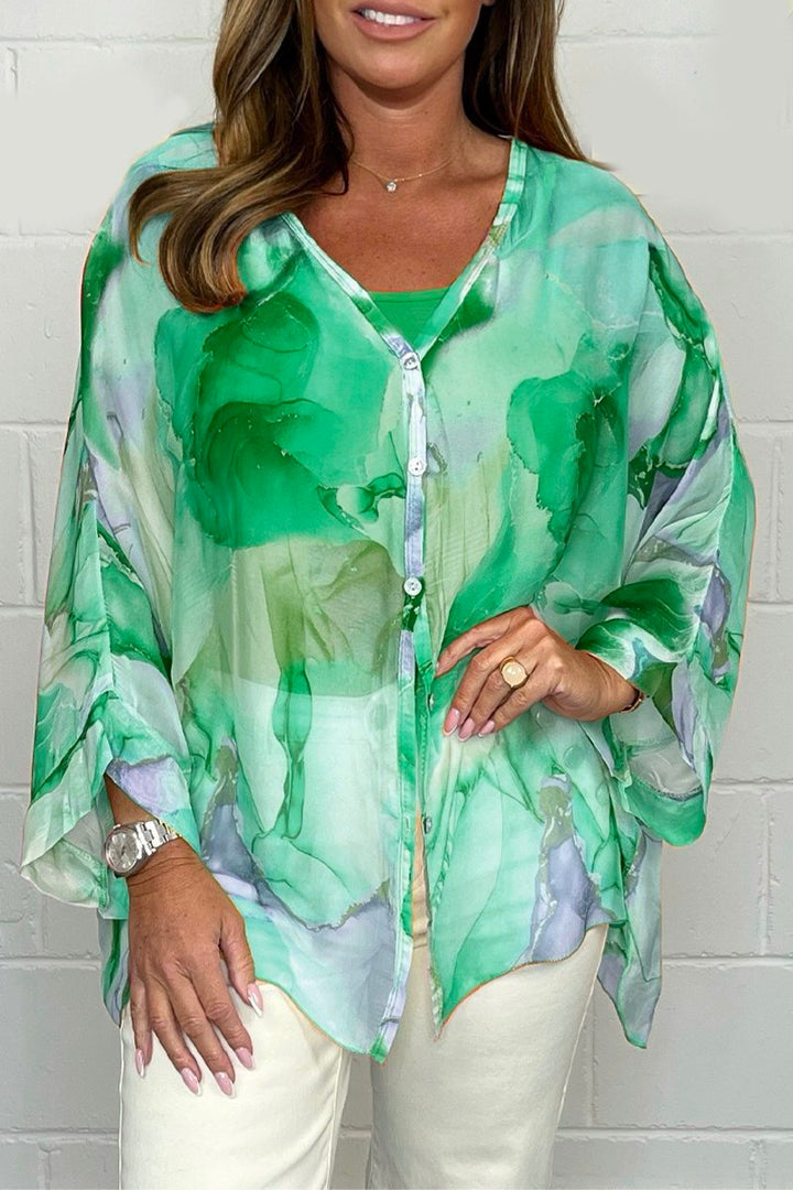 Stylish women's printed blouse, an elegant long sleeve top for effortless casual spring and summer fashion.