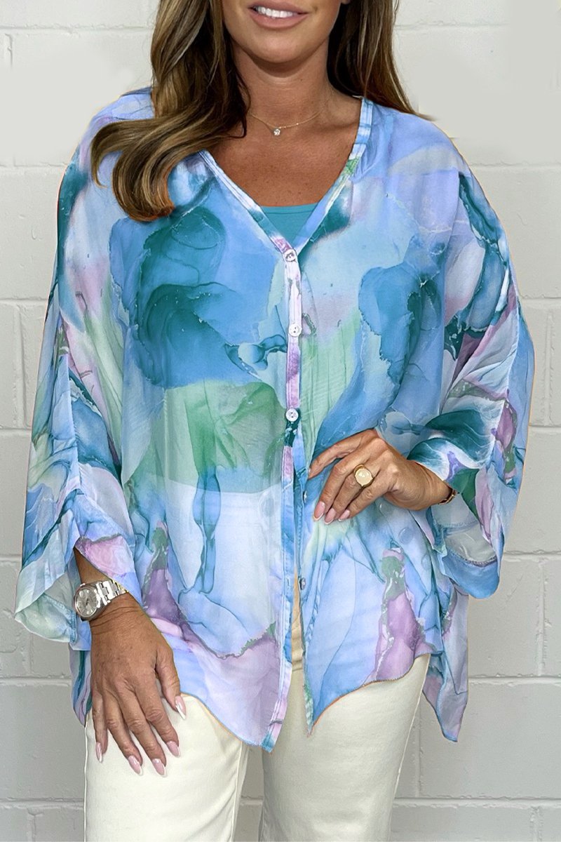 Women's sophisticated printed long sleeve blouse with a relaxed fit, ideal for elegant casual spring outfits.