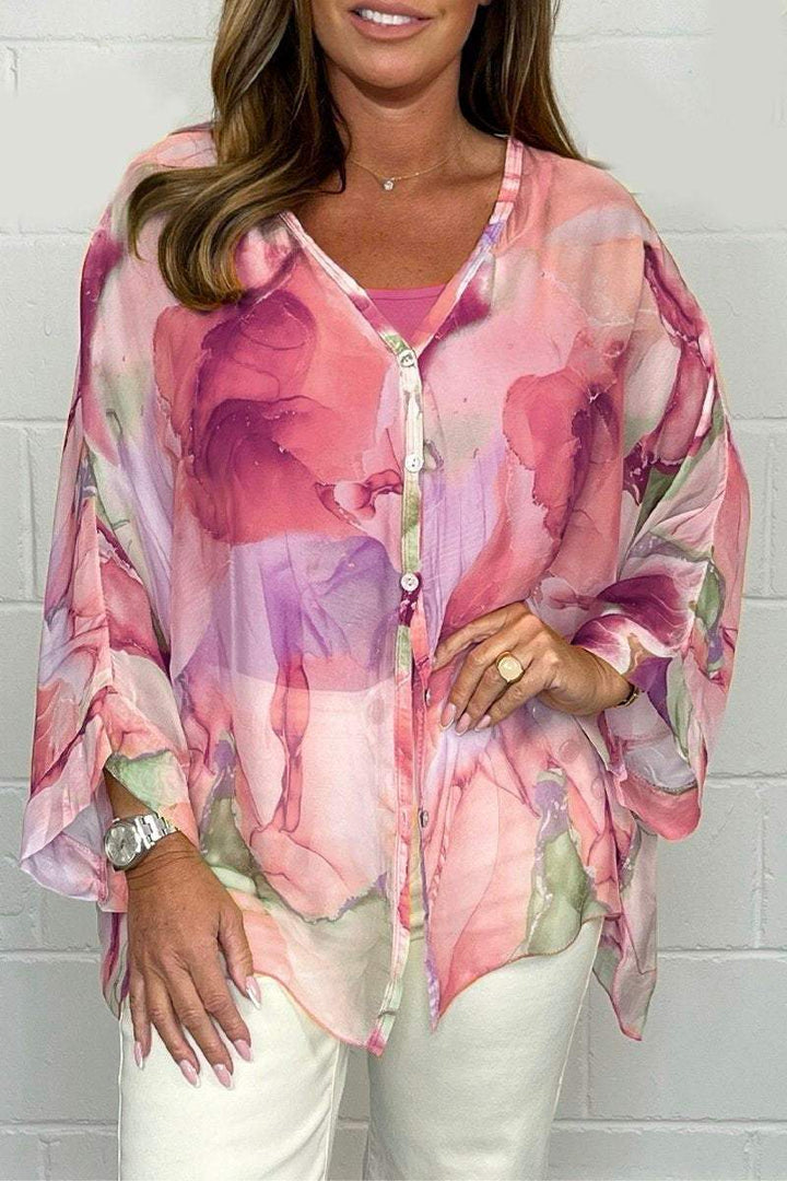 Relaxed fit women's printed long sleeve blouse, an elegant and versatile top for casual spring & summer style.