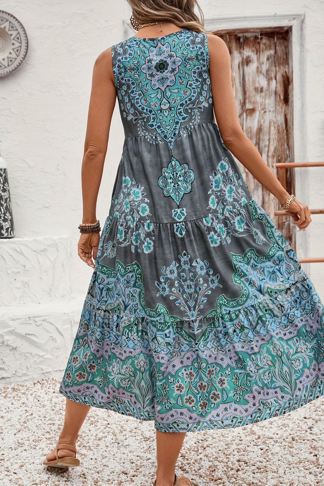 Long printed women's elegant maxi dress with a stylish pattern, ideal for party wear.