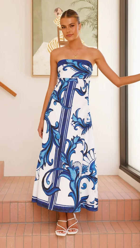 Vintage style women's printed maxi dress, comfortable & chic with flowy short sleeves for versatile fashion.