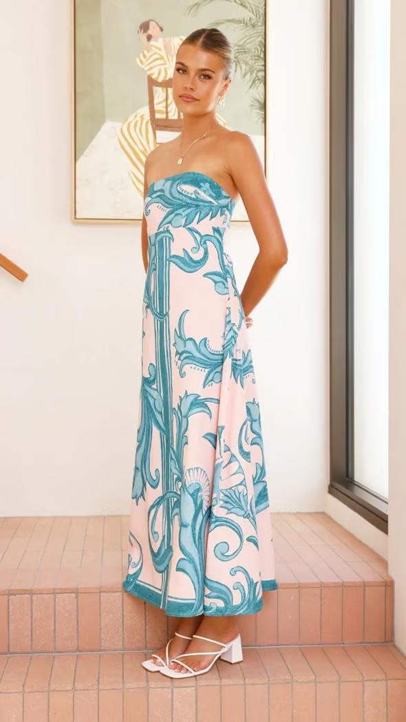 Chic printed maxi dress for women, with elegant flowy short sleeves, perfect for summer wedding guests.