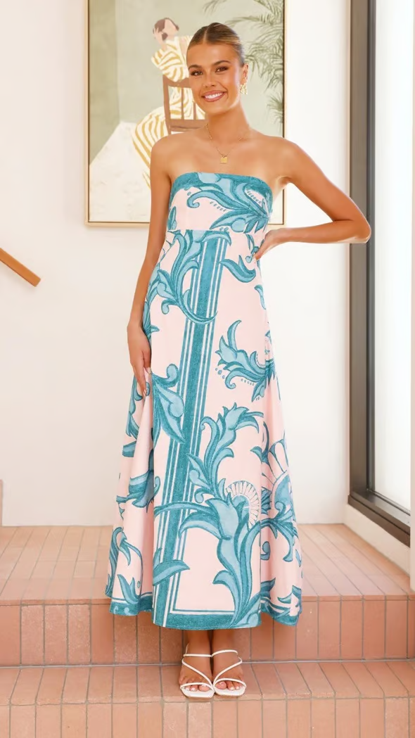 Women's elegant printed maxi dress, featuring a flowy silhouette & short sleeves for comfortable summer style.