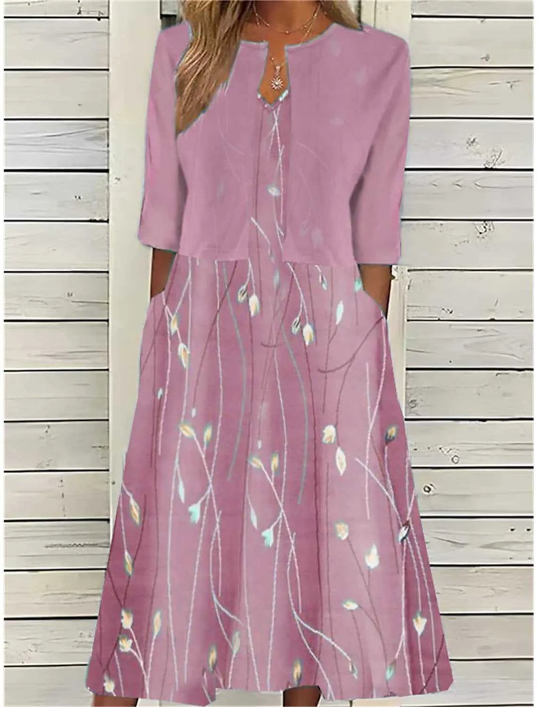 Chic 2-piece women's outfit: printed fit-and-flare midi dress with a coordinating 3/4 sleeve cover-up. Versatile.