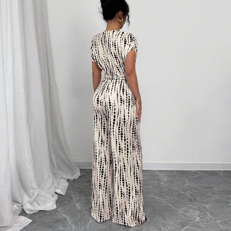 Chic women's one-shoulder printed wide-leg jumpsuit, a modern and elegant statement piece for special occasions.