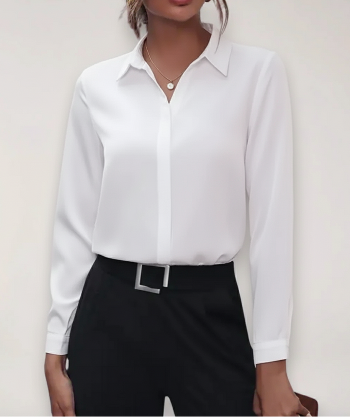 Professional women's long-sleeve buttoned blouse, a formal and elegant top for office and work attire.