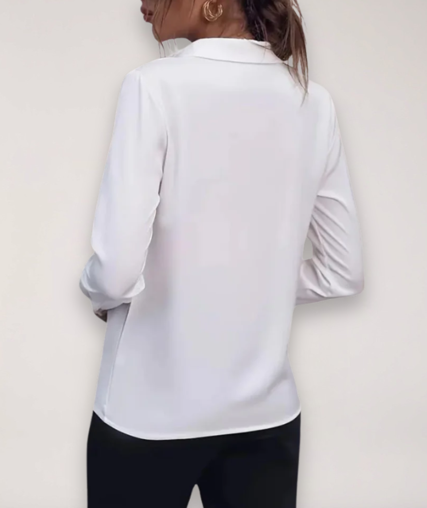 Sophisticated women's classic long-sleeve work blouse with buttons, perfect for professional office settings.