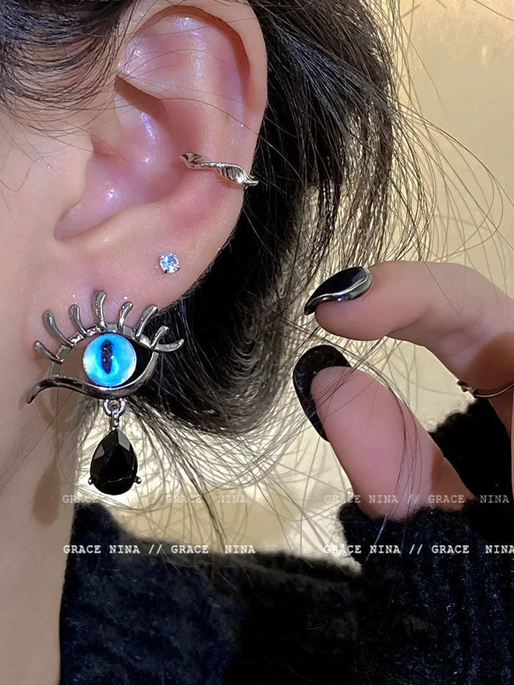 Stylish women's silver Evil Eye dangle earrings, featuring a protective charm and elegant drop design for daily wear.