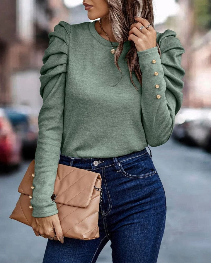 Premium women's puff sleeve blouse, designed with a round neck for an elegant & versatile look.