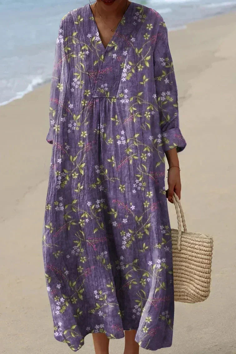 Elegant women's purple floral V-neck maxi dress with long sleeves. Perfect for spring/summer special occasions & comfortable wear.