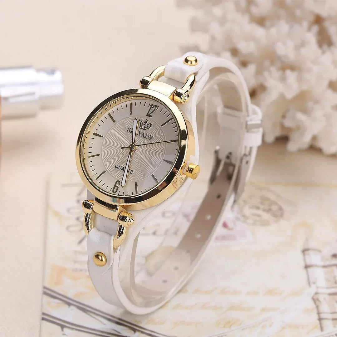 Modern women's quartz watch, chic design with a slim rose gold case and an interchangeable vegan leather strap.