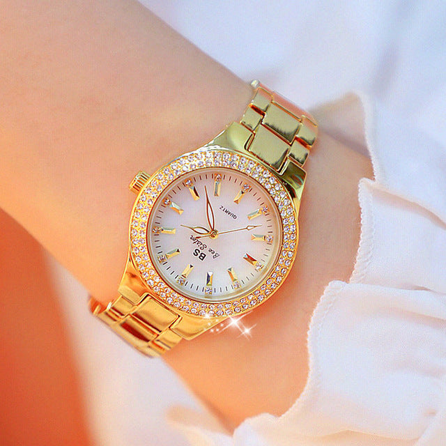 Aveline elegant ladies' watch featuring a mother-of-pearl face, crystal accents, and a classic two-tone bracelet.