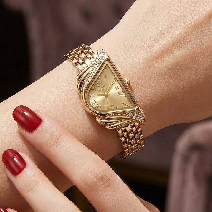 Close-up of modern women's quartz watch, unique irregular rhombus dial. Luxury fashion accessory for her.
