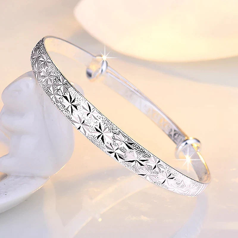 Adjustable sterling silver Radiant Star Armband Bracelet, elegant women's jewelry with a captivating celestial star.