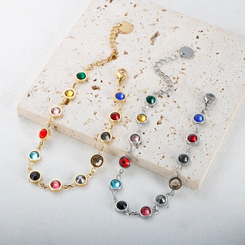 Sparkling rainbow crystal charm bracelet for women, featuring an elegant and colorful design.