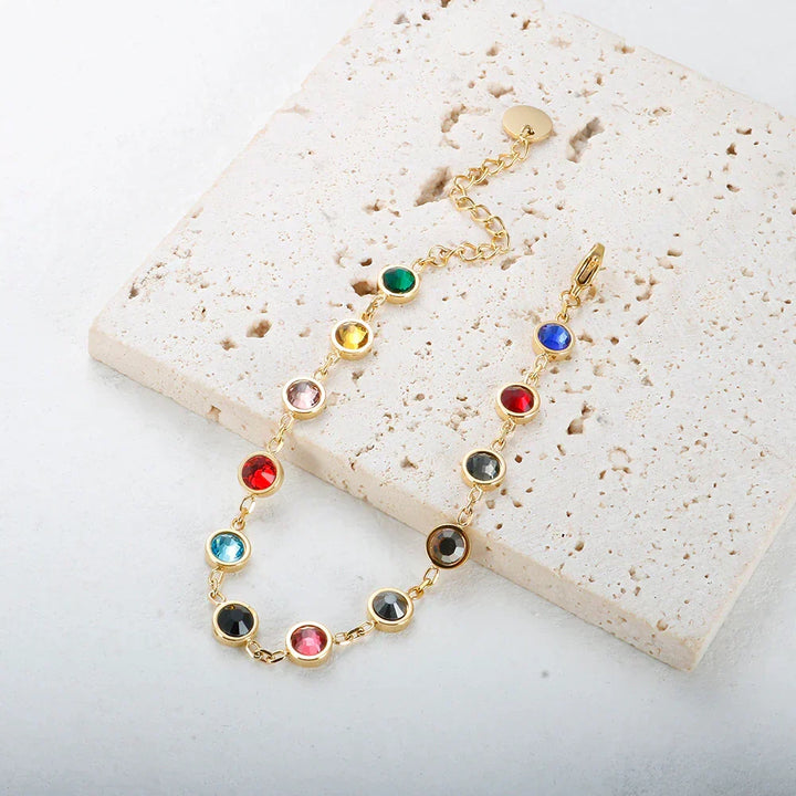 Stylish women's adjustable rainbow crystal charm bracelet, a colorful and elegant jewelry accessory.