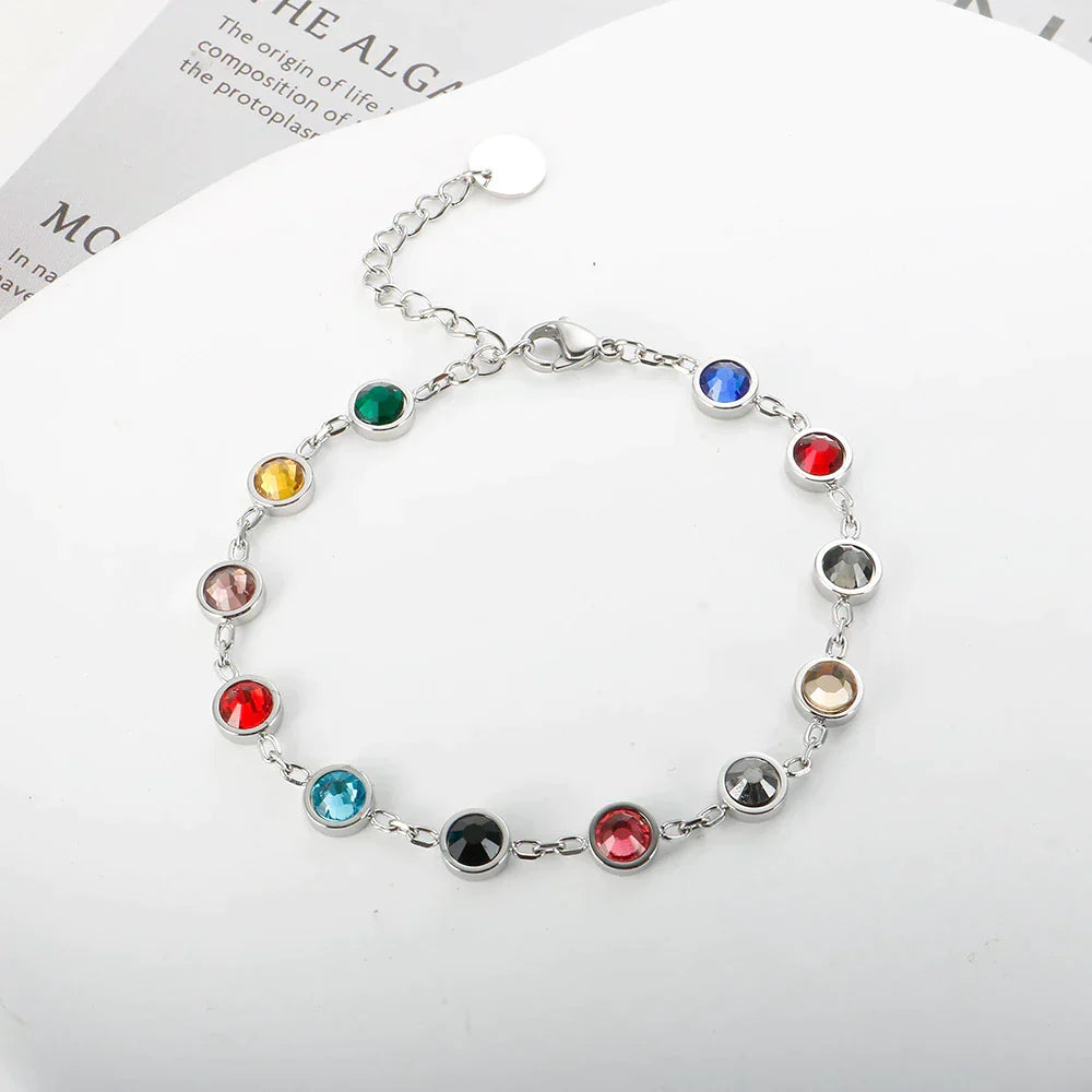 Stunning rainbow crystal charm bracelet, ideal colorful and elegant jewelry for women. Perfect accessory.